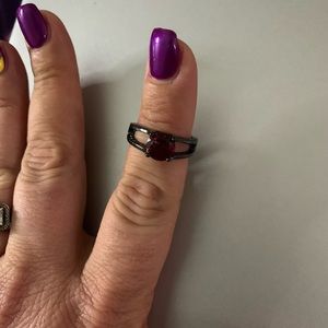 Garnet gun metal ring